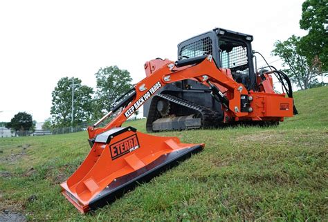 raptor track skid steer|raptor boom arm attachment.